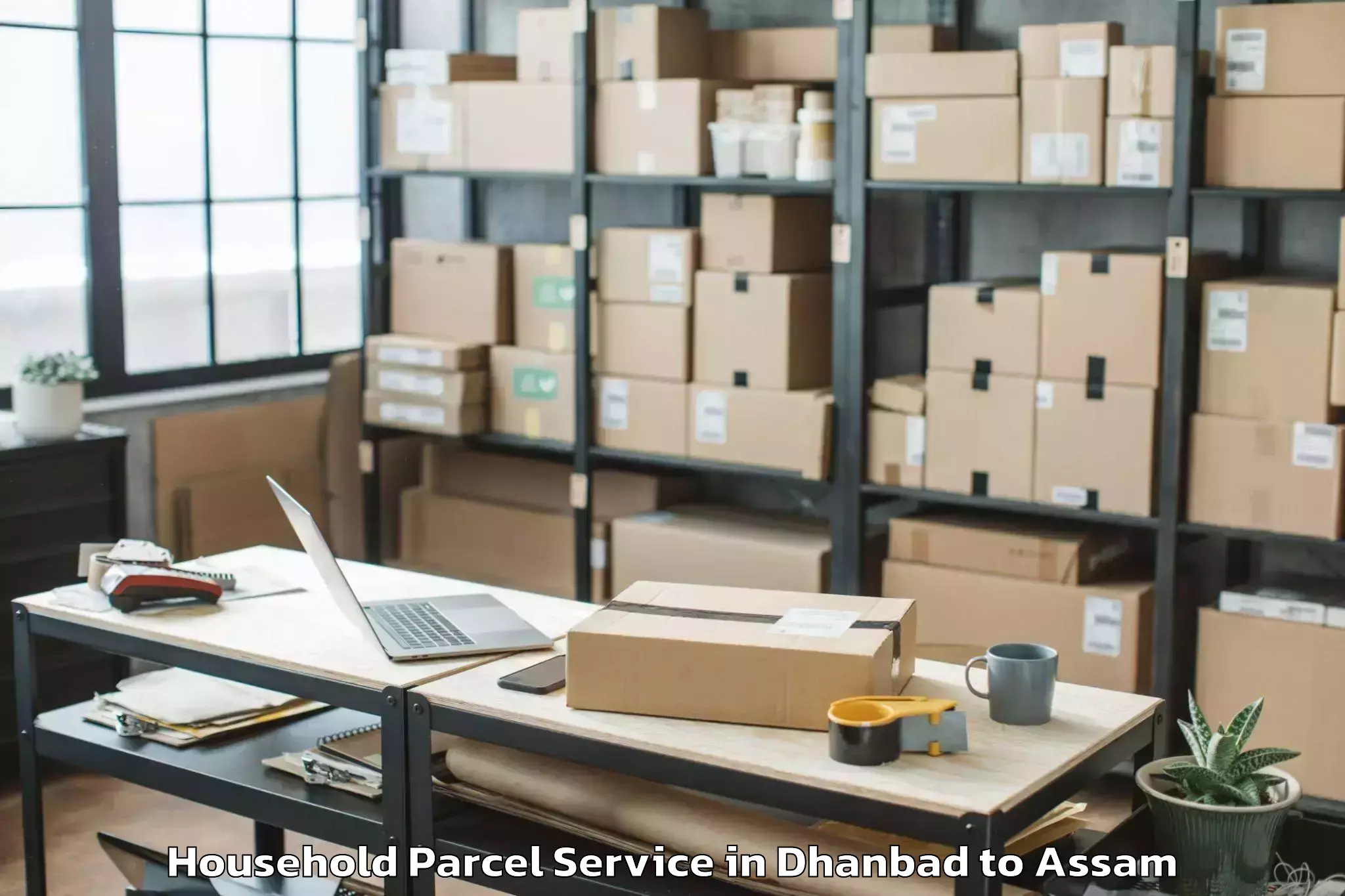 Book Your Dhanbad to Golaghat Household Parcel Today